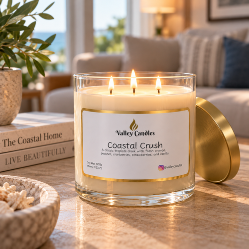Coastal Crush handmade soy candle lit, showing the flame and the melted wax pool